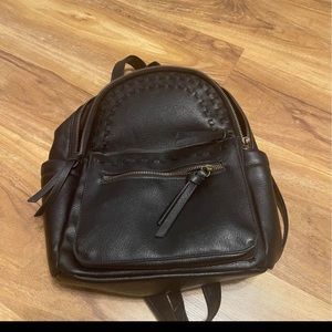 Small backpack/purse purchased from Ross. Zipper puller is missing.